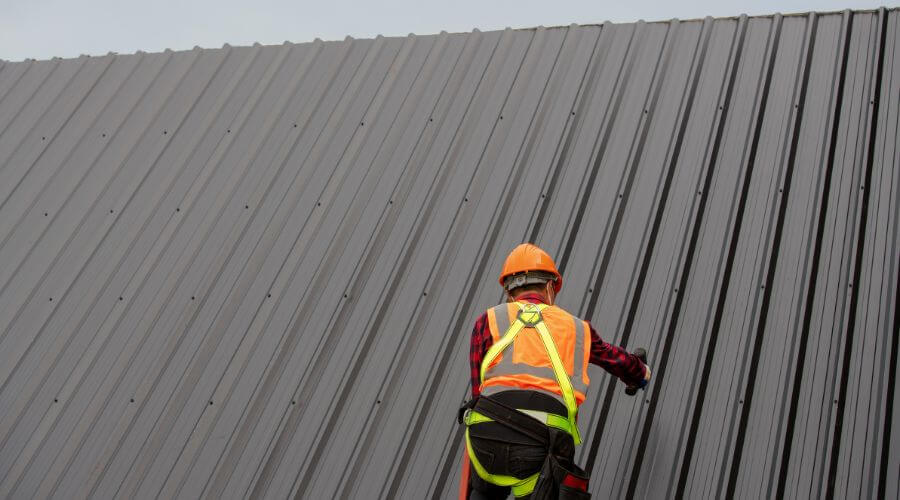 Professional metal roof installation services in Rousseau, KY